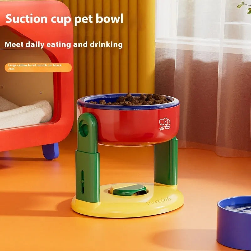 Suction cup cat bowl with adjustable lifting in pink on tile floor