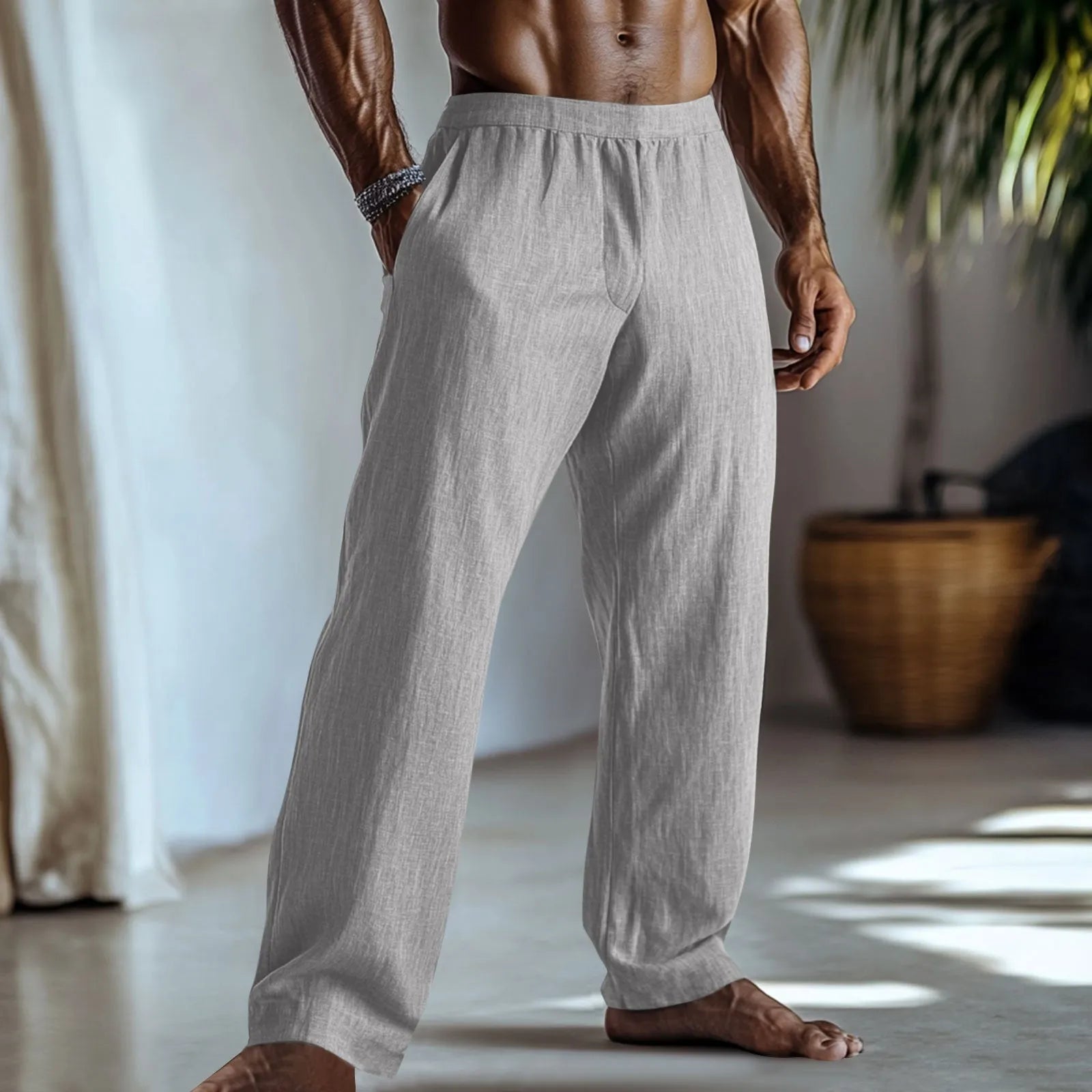 Straight-leg cotton and linen casual trousers in a light green colour, shown with visible pockets.