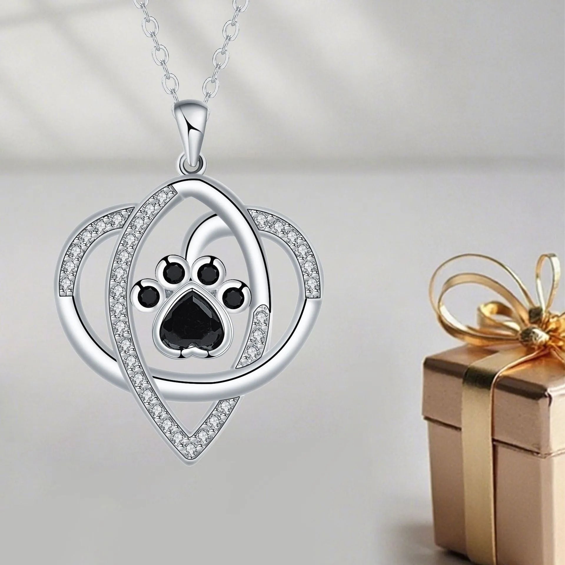 Dog and cat paw prints necklace with copper pendant on cross chain
