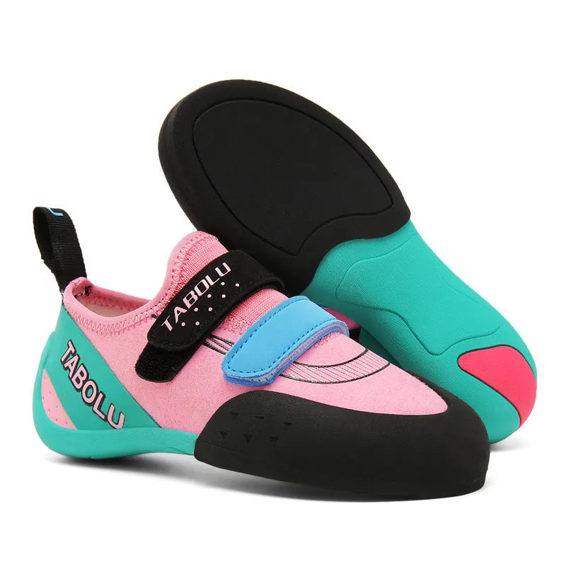Men's and women's black beginner rock climbing shoes with coloured accents and Velcro strap