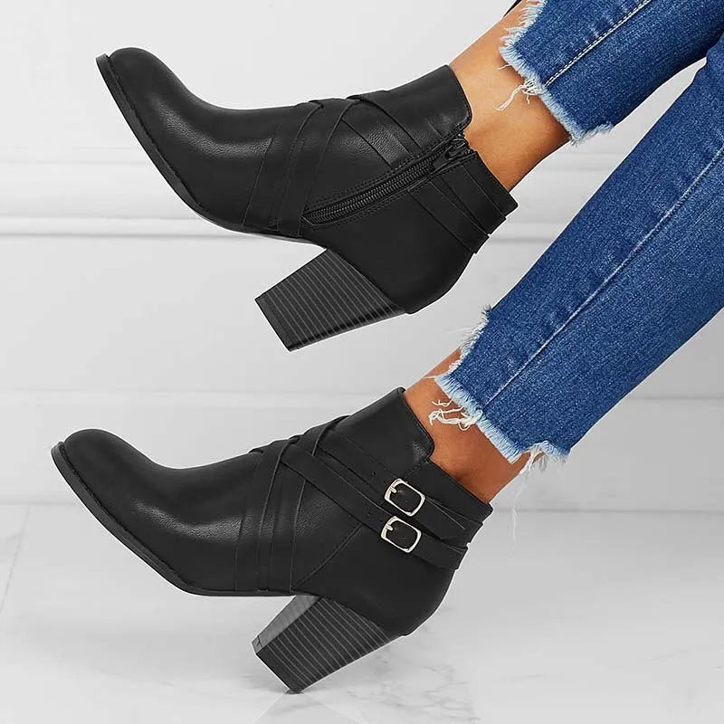 Women's grey PU leather short ankle boot with side zip, buckle strap, and a thick 7cm rubber heel.