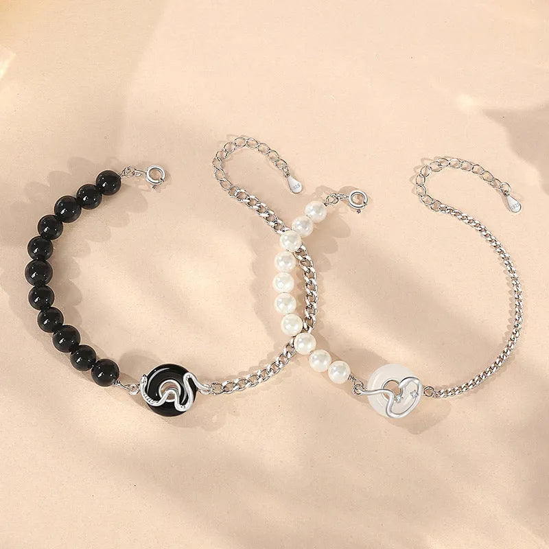 925 sterling silver Chinese obsidian pearl bracelet with safe buckle closure showing animal zodiac snake design