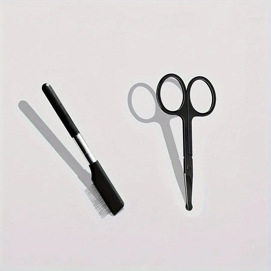 Black dual-ended pet grooming brush with soft brush and comb on a white background.
