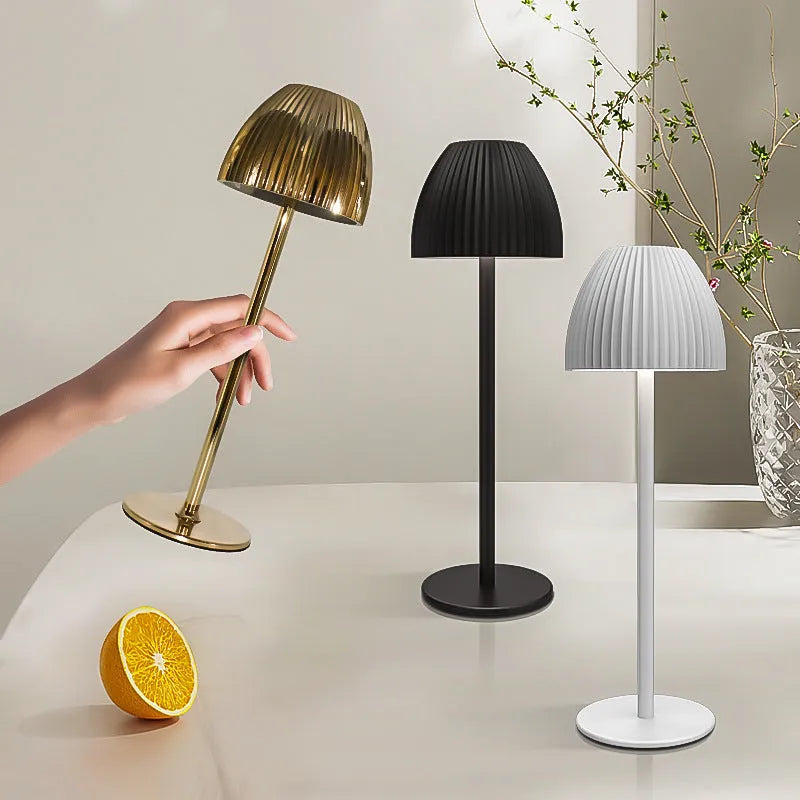 Small modern night lamp with dimming feature in black or white thin round bottom design