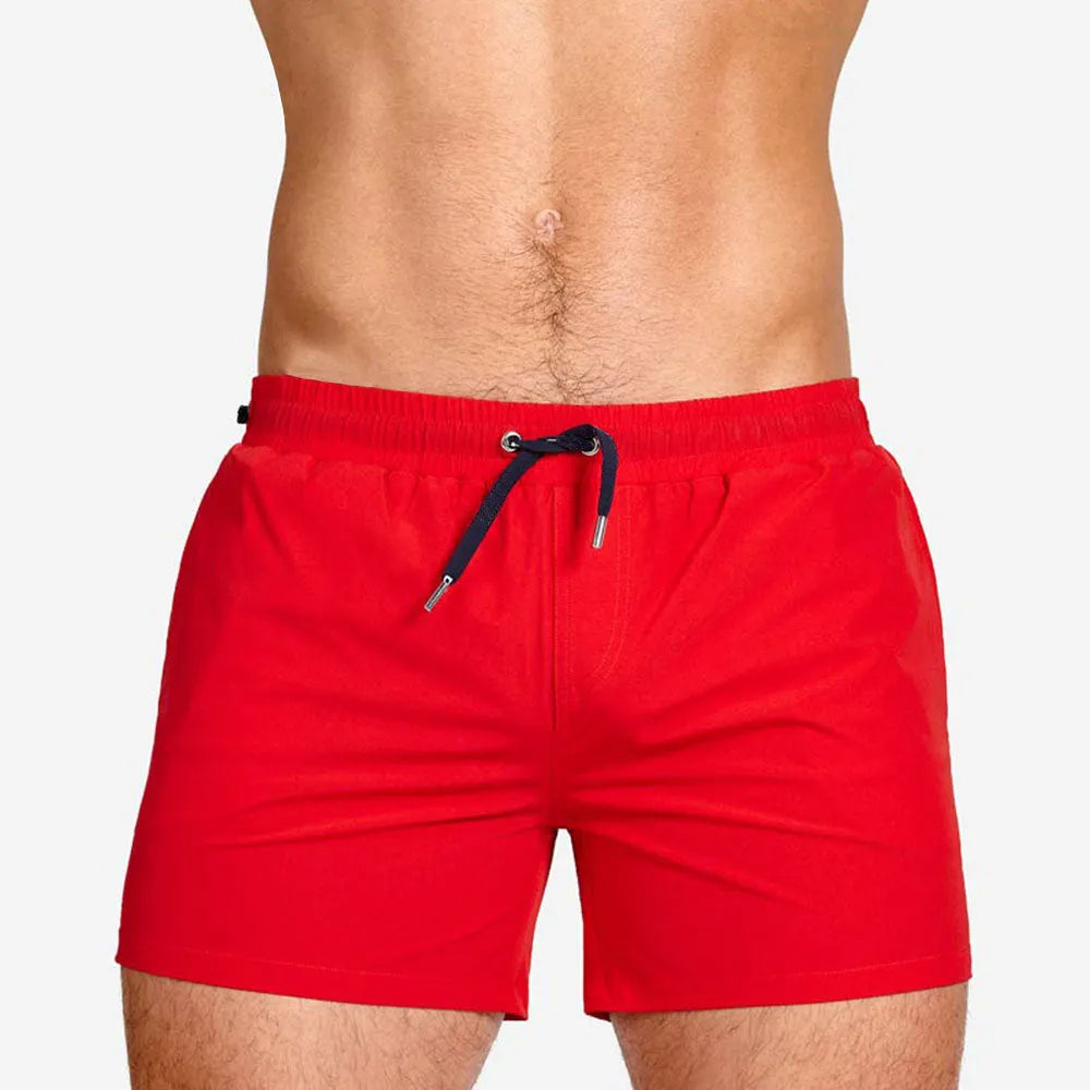Mesh lining swimming sports fitness shorts in polyester available in six solid colours