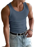 Men's tight fit polyester workout T-shirt with wool lining in various colours on a hanger.