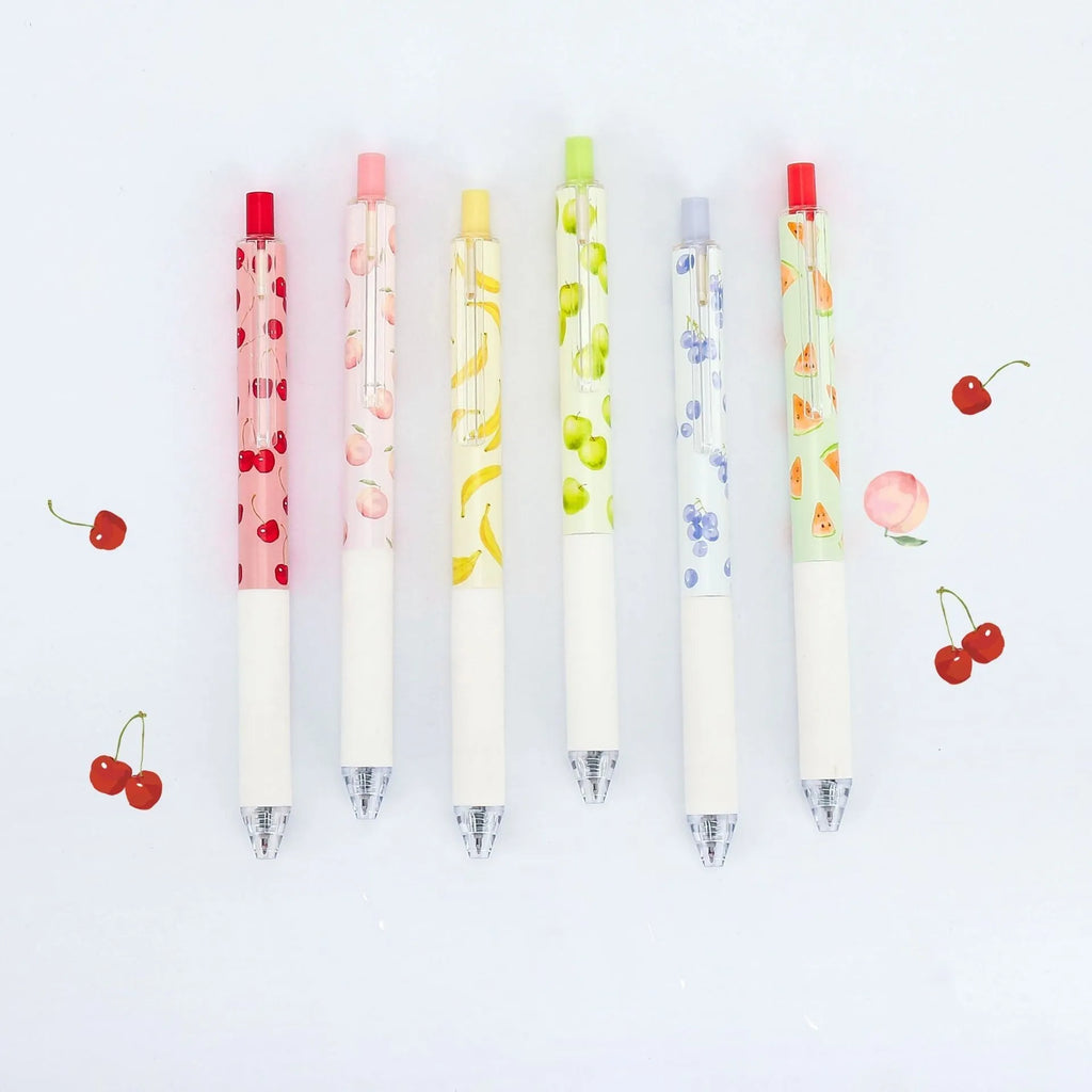 Three fruit-scented pressurised pens with push-button mechanisms and 0.5mm black refills