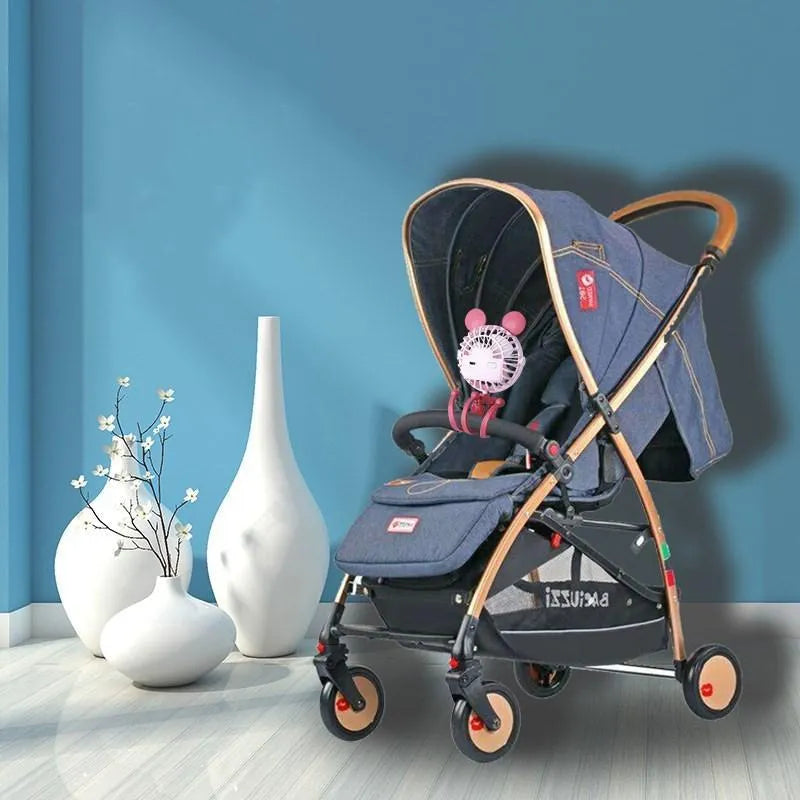 Pink portable stroller fan with octopus design, flexible clip, and LED night light