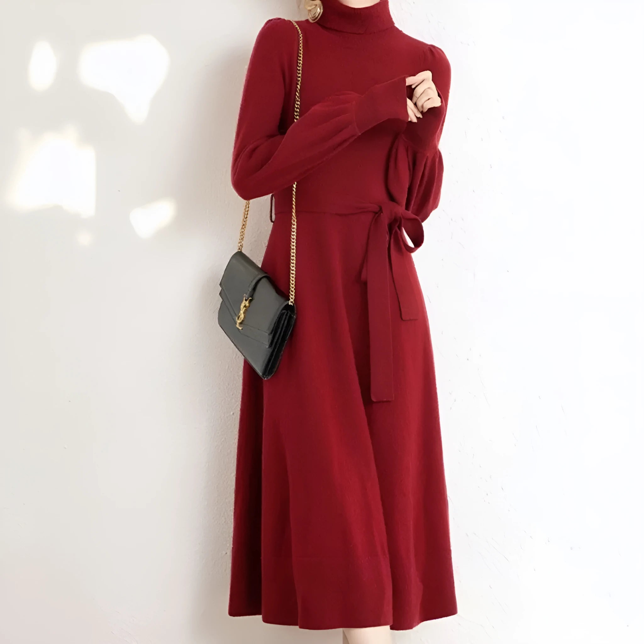 Turtleneck knitted dress with long sleeves, elastic waist, and loose hem in rose red, black, red, or blue colours