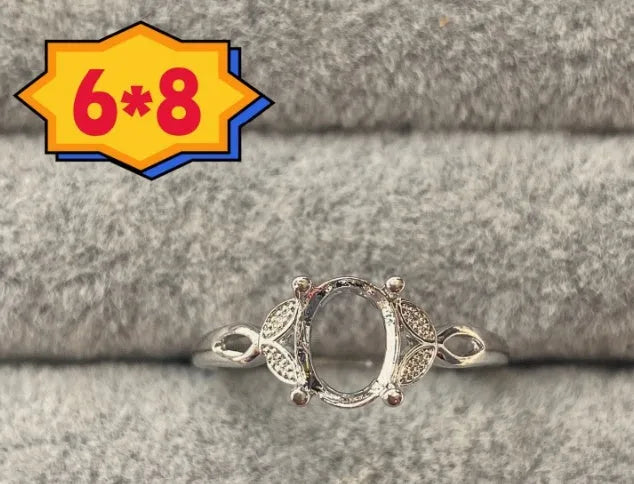 Oval denier ring with 6*8 stone, open mouth setting and star detail in Korean style
