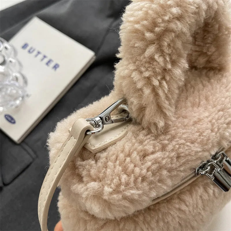 Soft plush women's shoulder bag in cream white, box shape with visible stitching and zipper pocket, street-trend style