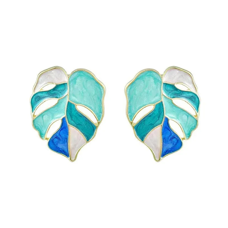 Maple leaf stud earrings with handmade drop oil finish, electroplated alloy, available in green or pink.