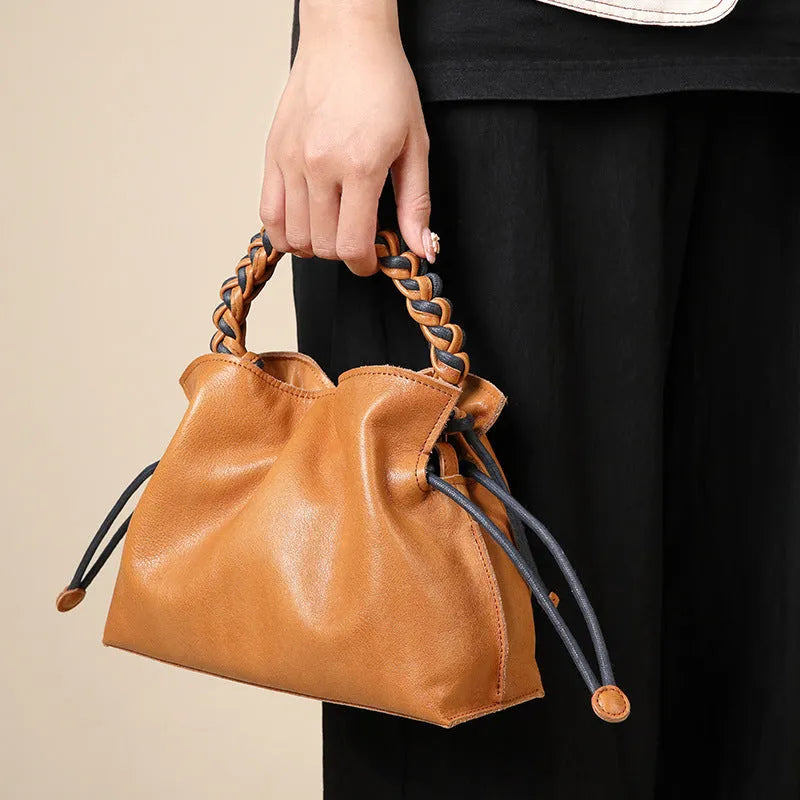 Cortex Splicing Woven women's casual crossbody bag in orange genuine leather with woven texture