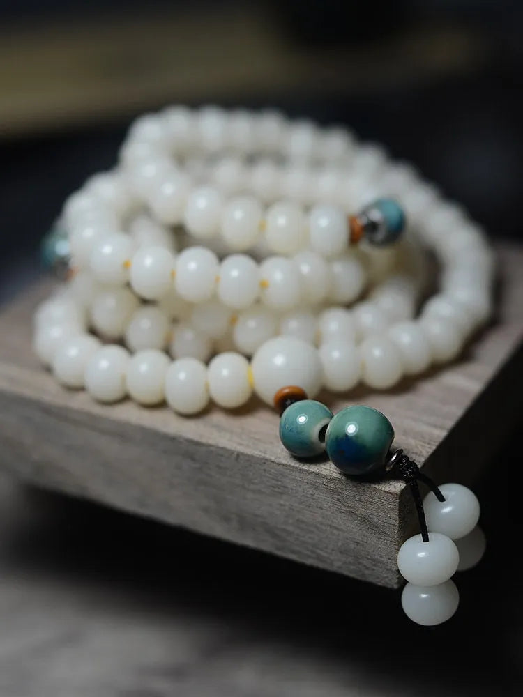White jade bodhi root bracelet with 108 flat round beads in two sizes