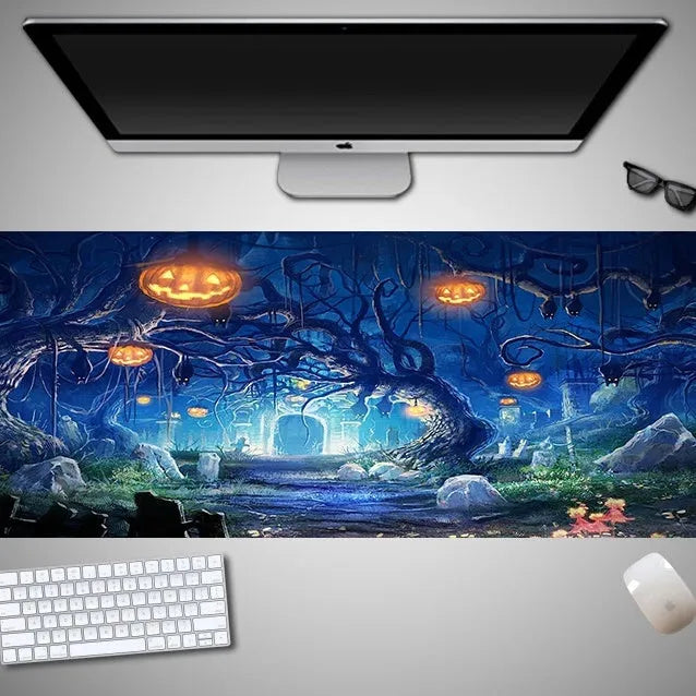Oversized Halloween-themed computer mouse pad with non-slip rubber cloth backing on wooden desk