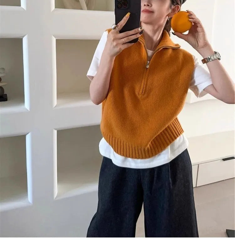 Retro half zip sleeveless knit vest in mesh polyester fabric showing 3D pattern detail