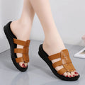 Women's flat-bottom slippers in beige, black, or brown with soft sole and PU construction