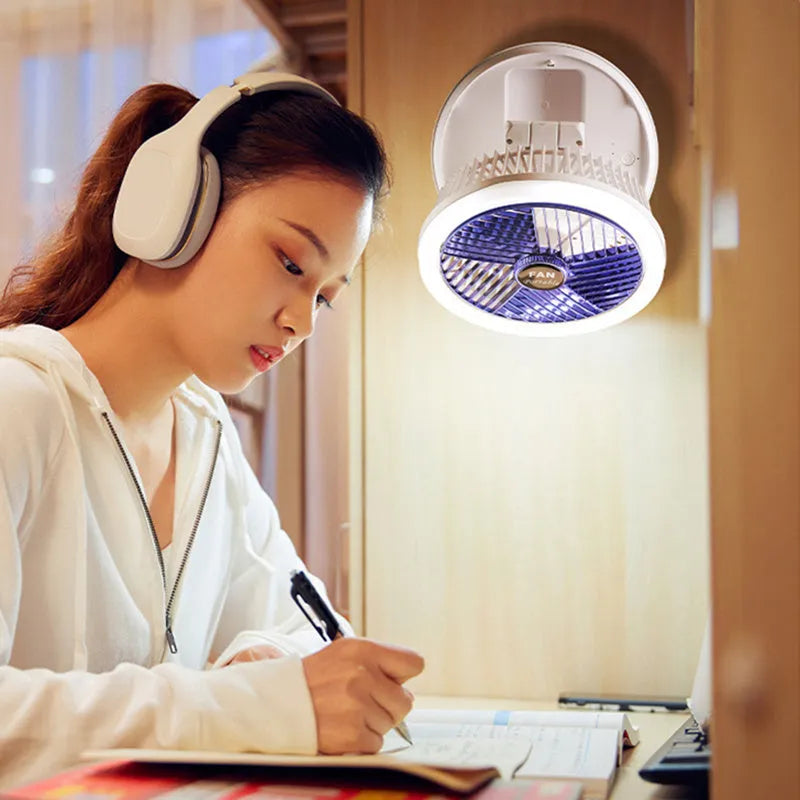 Blue foldable USB charging fan with LED light showing desk and wall mounting options