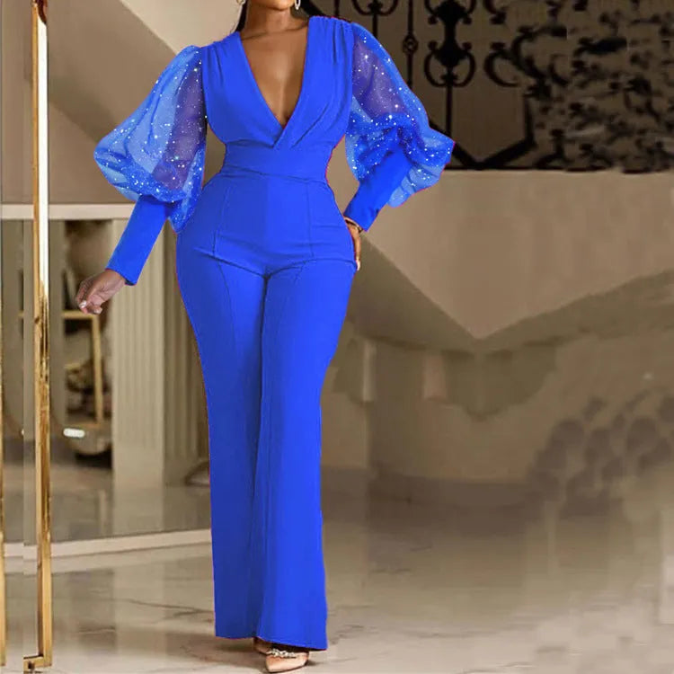 Women's mesh stitching jumpsuit with long sleeves, elastic waist, and wide legs in blue.