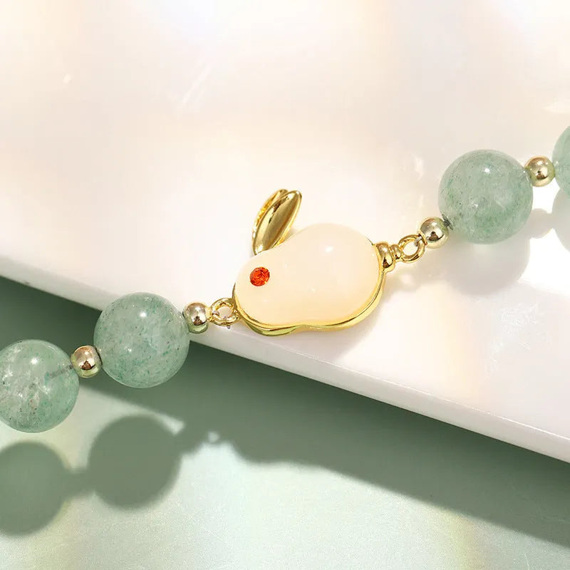 Rabbit charm bracelet with green aventurine or strawberry quartz beads