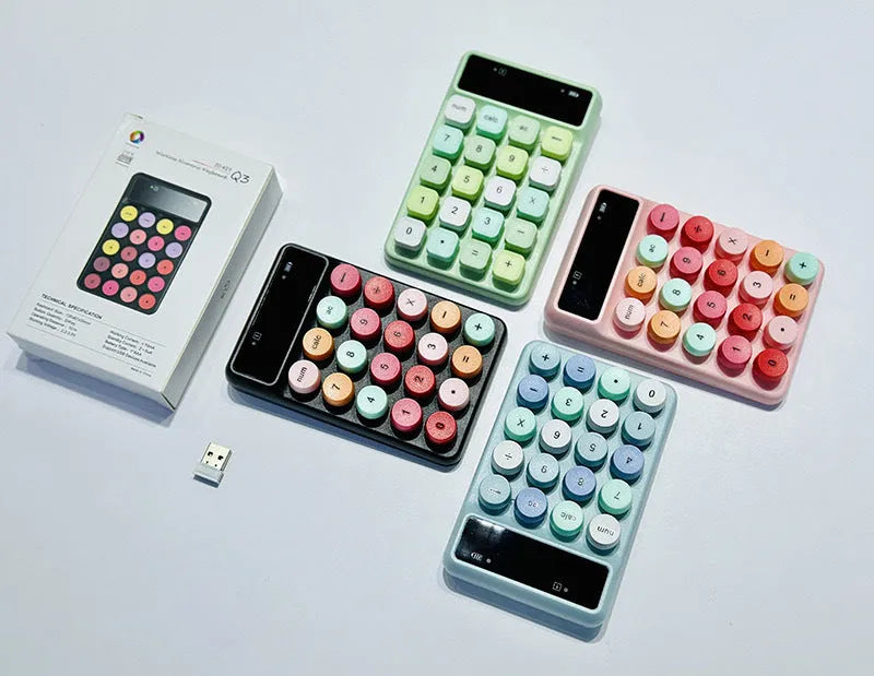 Mini portable wireless keyboard showing macaron colour options on ABS plastic construction