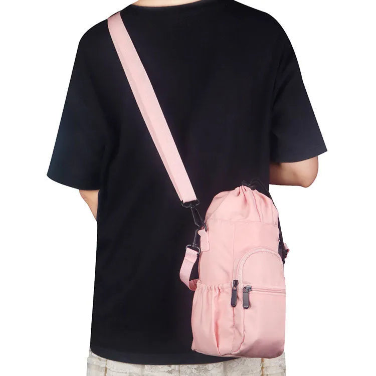 Cloth water bottle pouch with crossbody strap in black, green, and pink colour options.