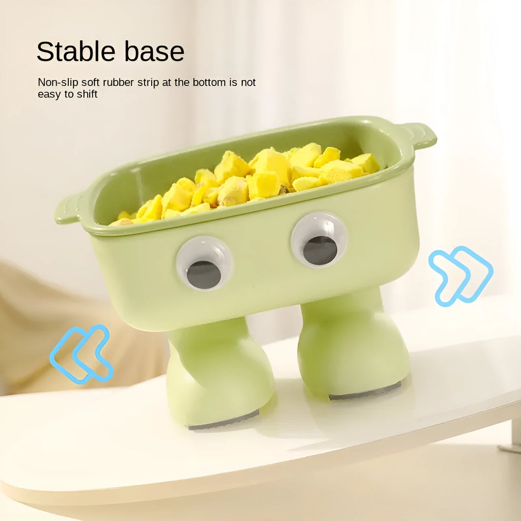Green robot-shaped elevated cat bowl with 15-degree tilt and detachable inner dish