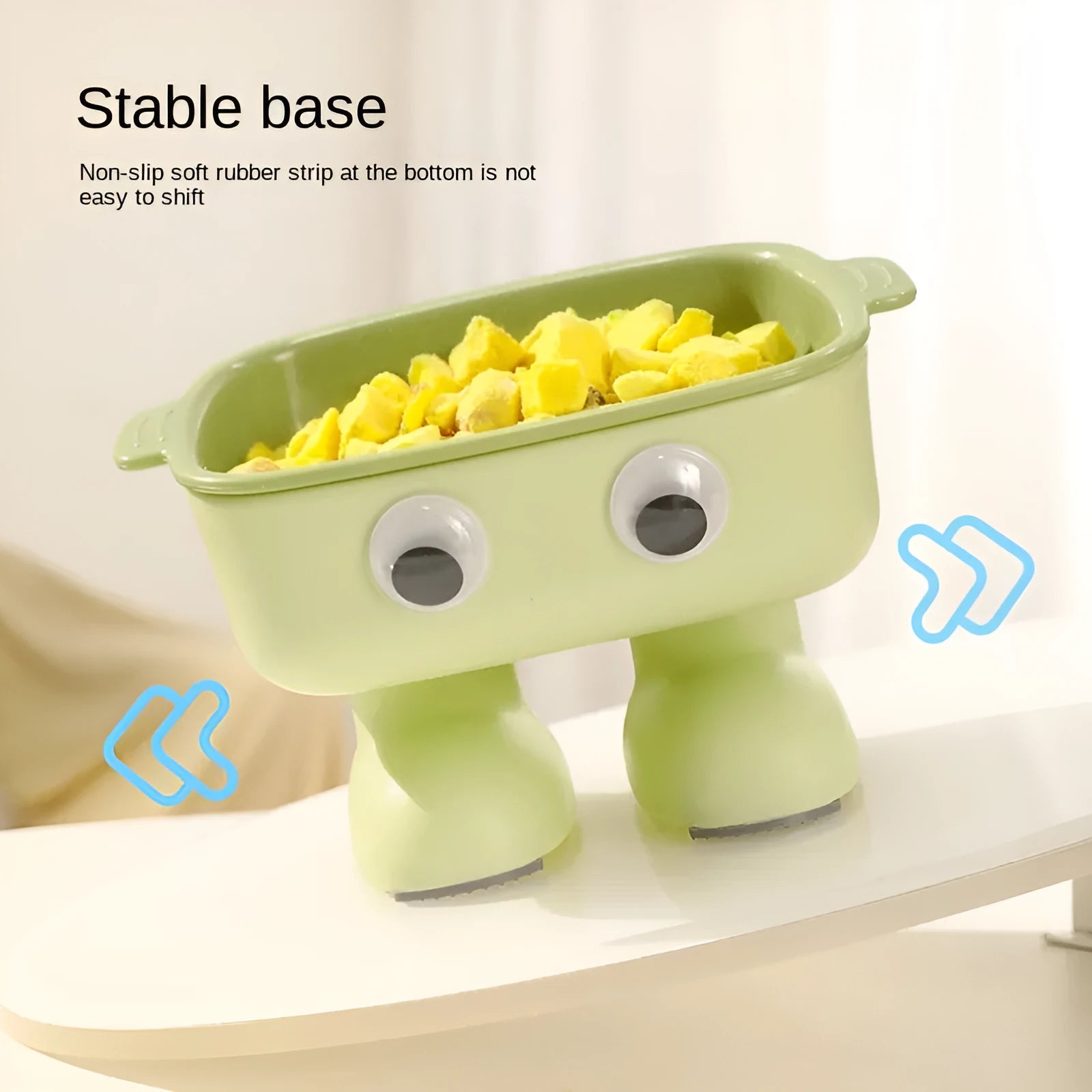 Green robot-shaped elevated cat bowl with 15-degree tilt and detachable inner dish