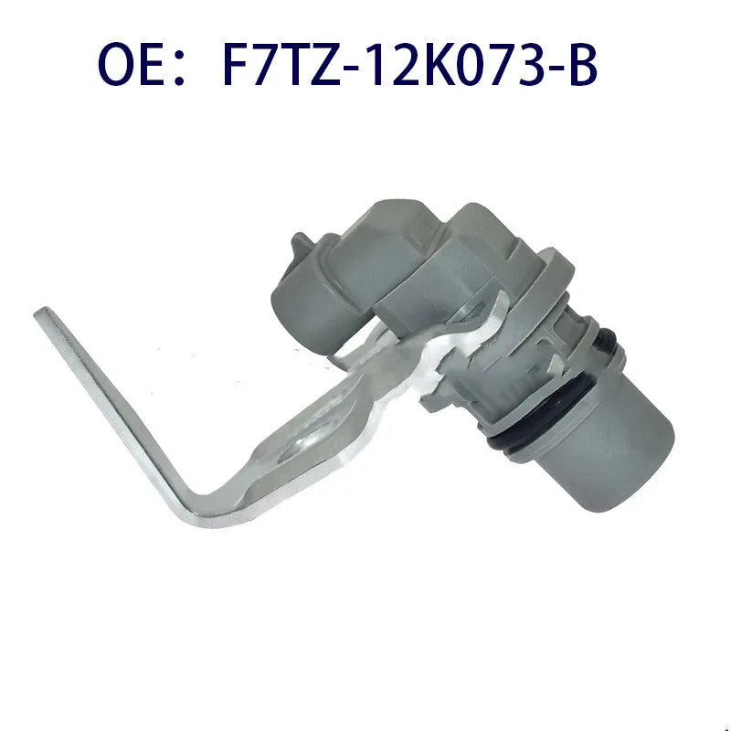 Ford CMP camshaft position sensor part number F7TZ12K073B with automotive electrical connectors