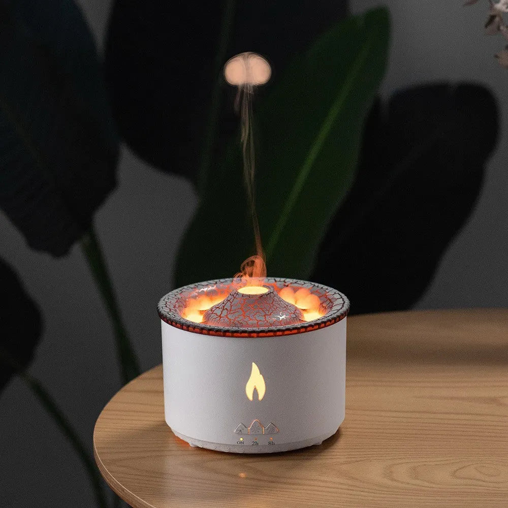 White round humidifier producing a two-colour blue and white volcanic spray ring of mist.