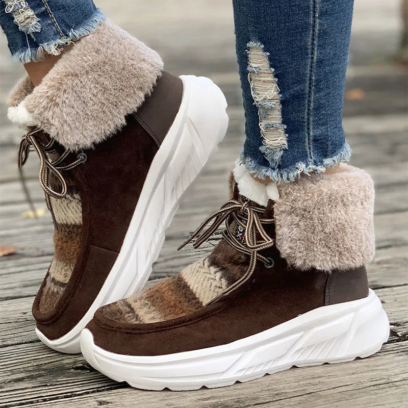 Women's beige lace-up snow boots with suede upper and thermal plush lining on a rubber sole.