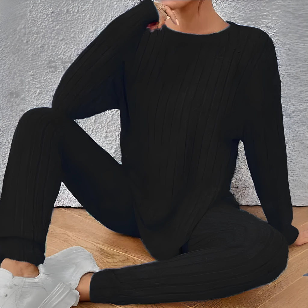 Women's black sunken stripe two-piece lounge set with regular sleeves and matching trousers