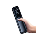 Black portable electric car air pump with pressure gauge and inflation tube
