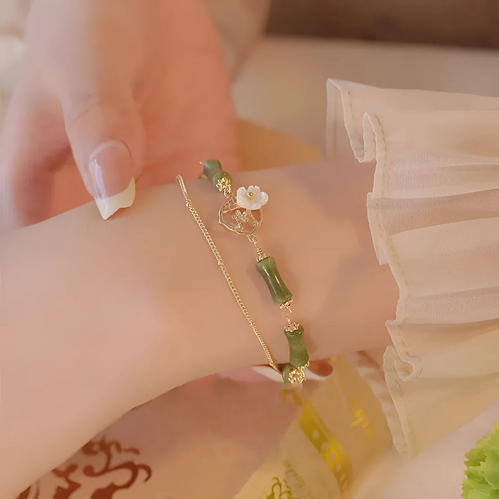 Green olivine double layer bracelet with Bells of Ireland charms and olive branch detailing for women