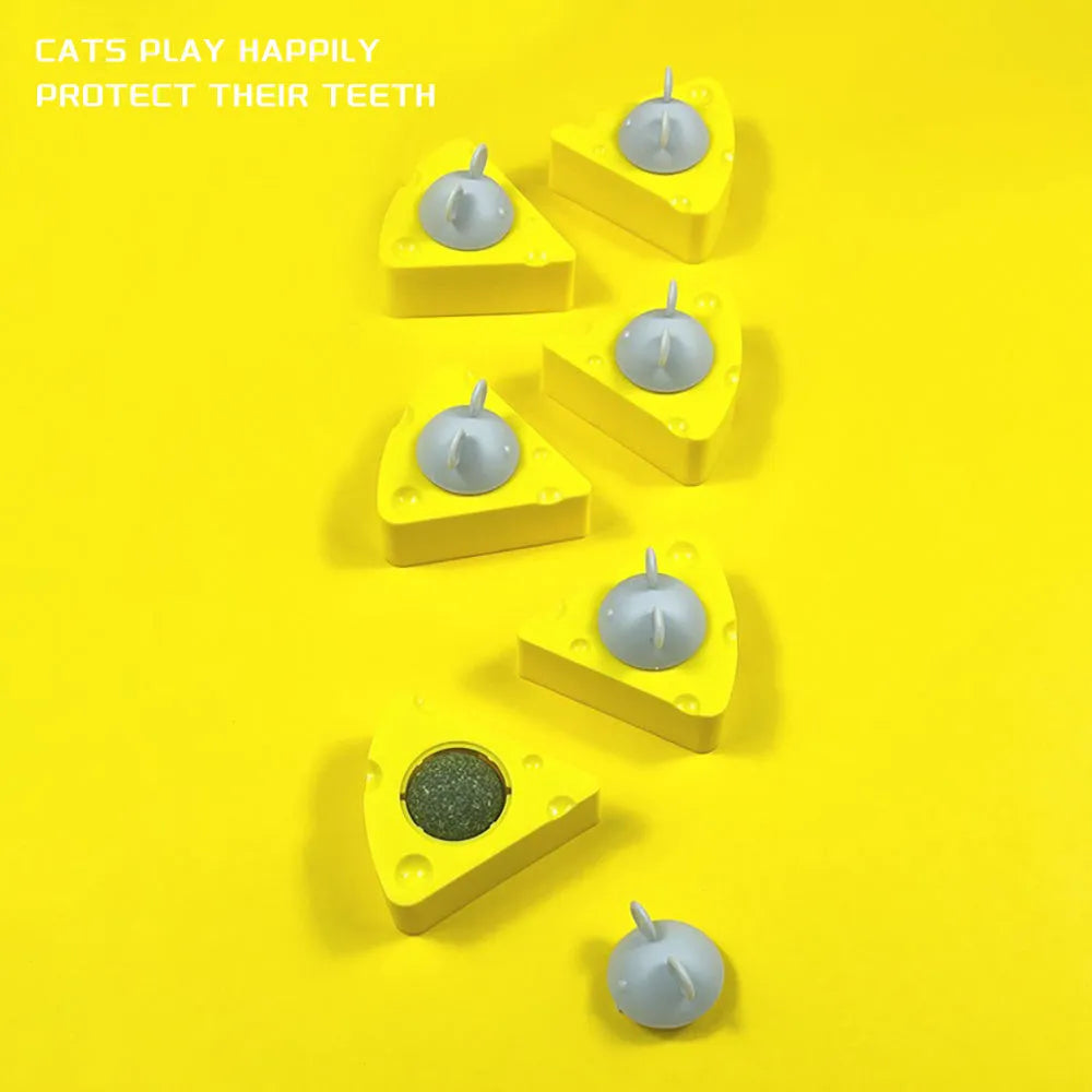 Yellow catnip and silvervine chew toy balls for cat teeth cleaning and play