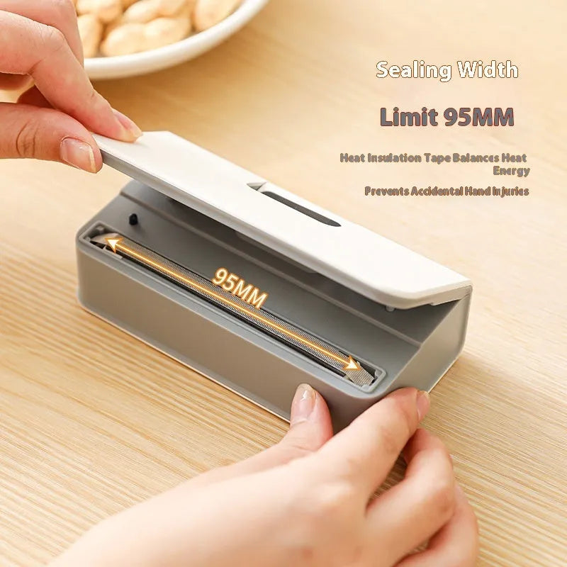 White portable mini heat sealing machine for plastic food bags measuring 4x3.5x14.4cm