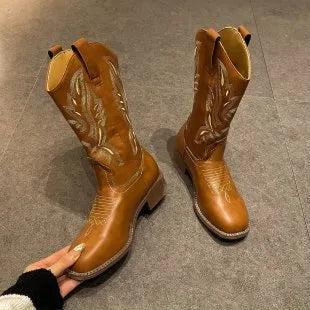 Brown embroidered women's mid-calf Martin boots with leather lining and a low square heel.