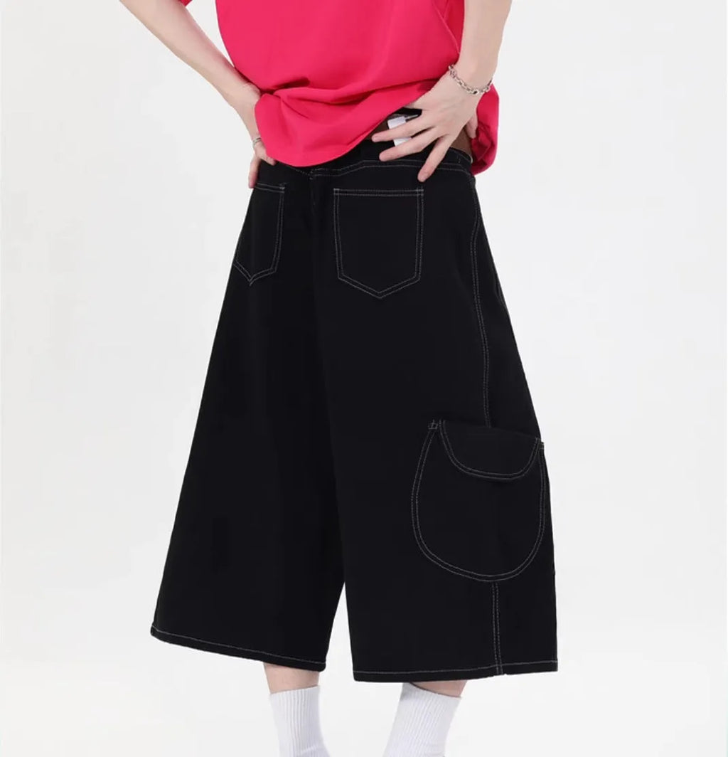 Retro denim workwear shorts with wide leg design and multiple pockets in red and black colours