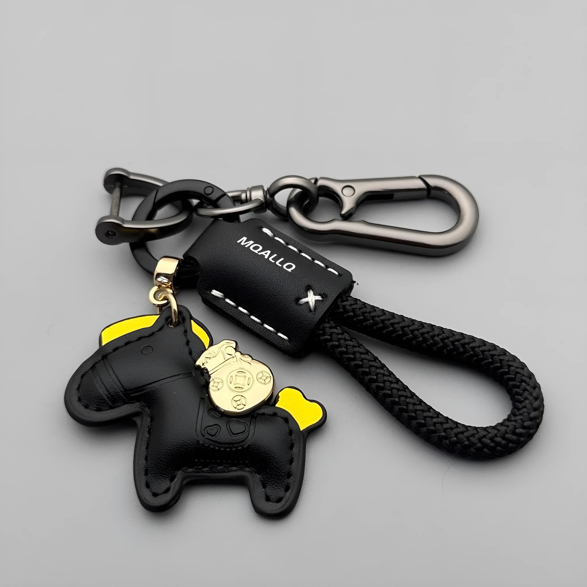 Handmade car keychain with a zinc alloy pony charm on a cowhide cord, shown in multiple colour options.
