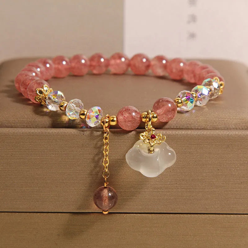 Women's strawberry quartz crystal bracelet with white agate auspicious clouds design