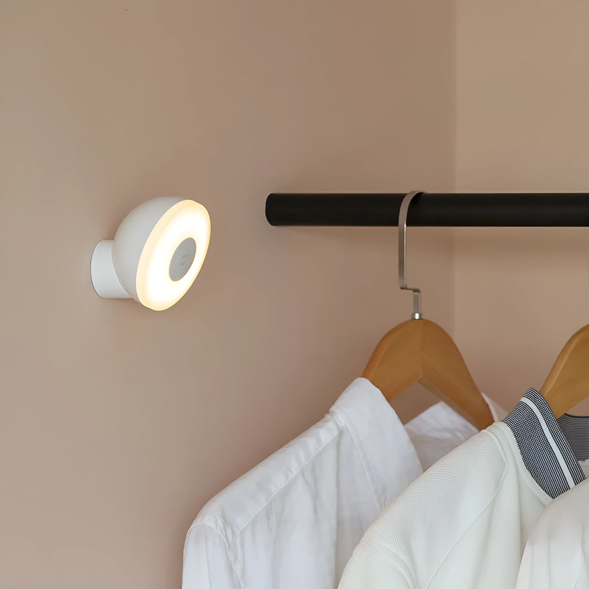 White modern Mijia induction bedside lamp with compact cubic design on a table.