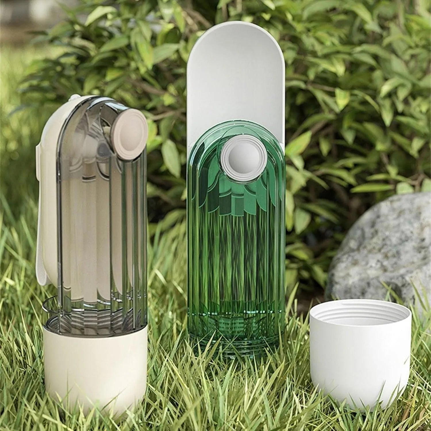 Beige or green foldable dog water bottle and food dispenser for outdoor walking and hiking