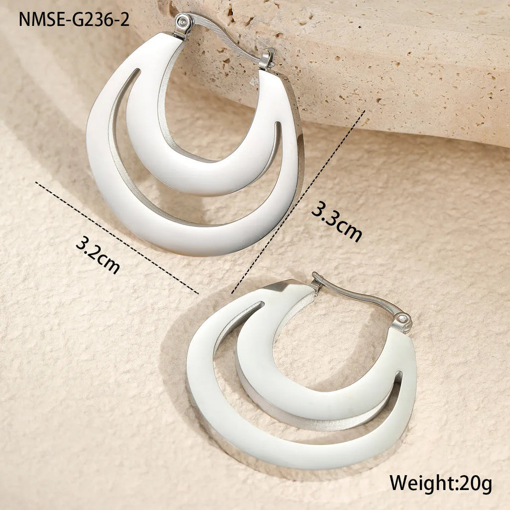 Geometric French minimalist earrings in gold or steel plating with circular ring design