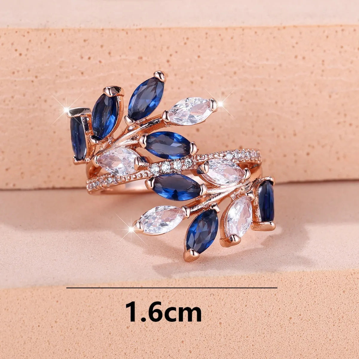 Adjustable leaf-shaped ring with horse eye cubic zirconia design in copper with rose gold plating