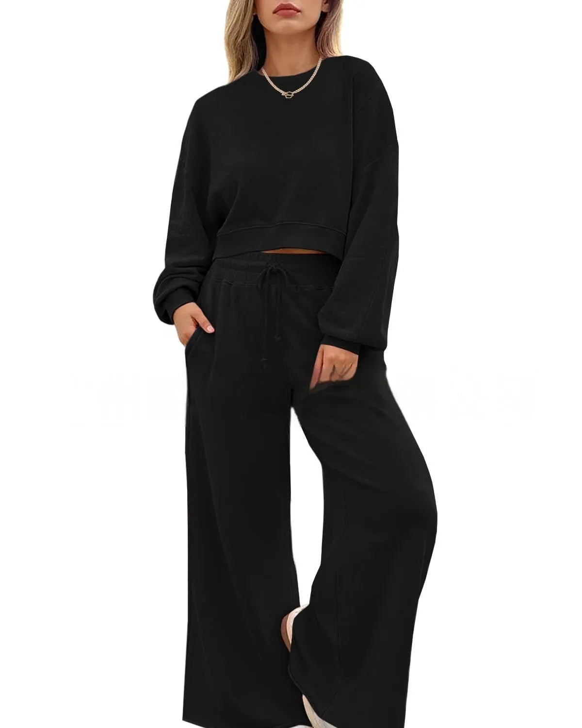 Women's solid colour polyester trousers two-piece set showing long sleeves top and matching trousers