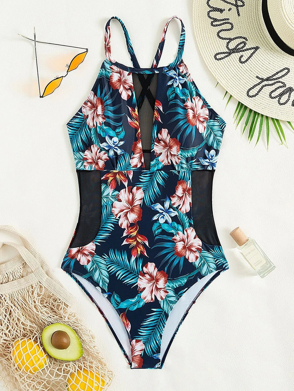 Women's deep V neck one-piece swimsuit in a printed pattern with polyester lining.