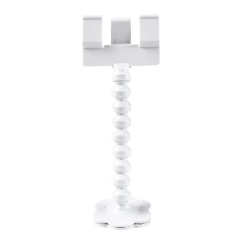 Black plastic pet photography clip holding a phone, with a rotating arm to grip dog or cat treats for photos.