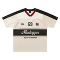 Apricot V-neck sports jersey top with lettered pattern and drop-shoulder sleeves laid flat