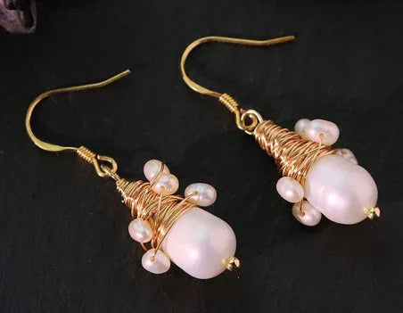 Handmade natural pearl embellished wire-wrapped earrings in geometric round shape for women