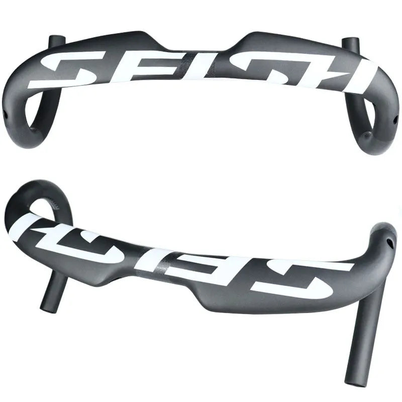 Carbon fibre road bike drop handlebar showing 31.8mm clamp and classic bend.